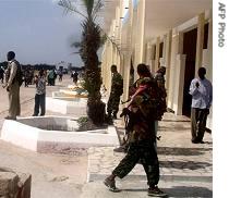 Islamic Court fighters wait  at the airport of Mogadishu, Somalia, 25 Dec 2006