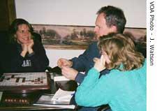 Judy Fitzpatrick Weber (left) playing Scrabble next to Paul Webber and Mary Fitzpatrick (Leo's daughter-in-law)