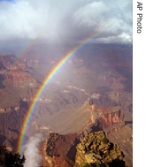 Two rainbows form at Hopi Point, at Grand Canyon National Park in Arizona
