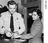 Rosa Parks is fingerprinted after her arrest in Montgomery, Alabama