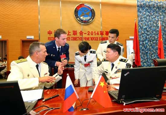 Directors of the Chinese and Russian naval forces arrange the deployment of forces in Shanghai, east China, May 20, 2014. The week-long China-Russia "Joint Sea-2014" exercise kicked off on Tuesday. A total of 14 vessels, two submarines, nine fixed-wing aircraft as well as helicopters and special forces from both sides will take part in the exercise. (Xinhua/Zha Chunming) 