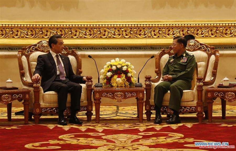 Chinese Foreign Minister Wang Yi (L) meets with Commander-in-Chief of Myanmar
