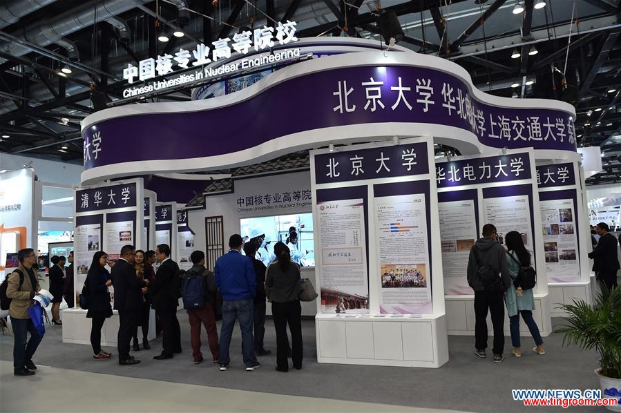 People visit the 14th China International Nuclear Industry Exhibition & the 20th Pacific Basin Nuclear Conference in Beijing, capital of China, April 6, 2016. Some 300 exhibitors from 12 countries participated in the exhibition that opened here on Wednesday. (Xinhua/Li Xin) 