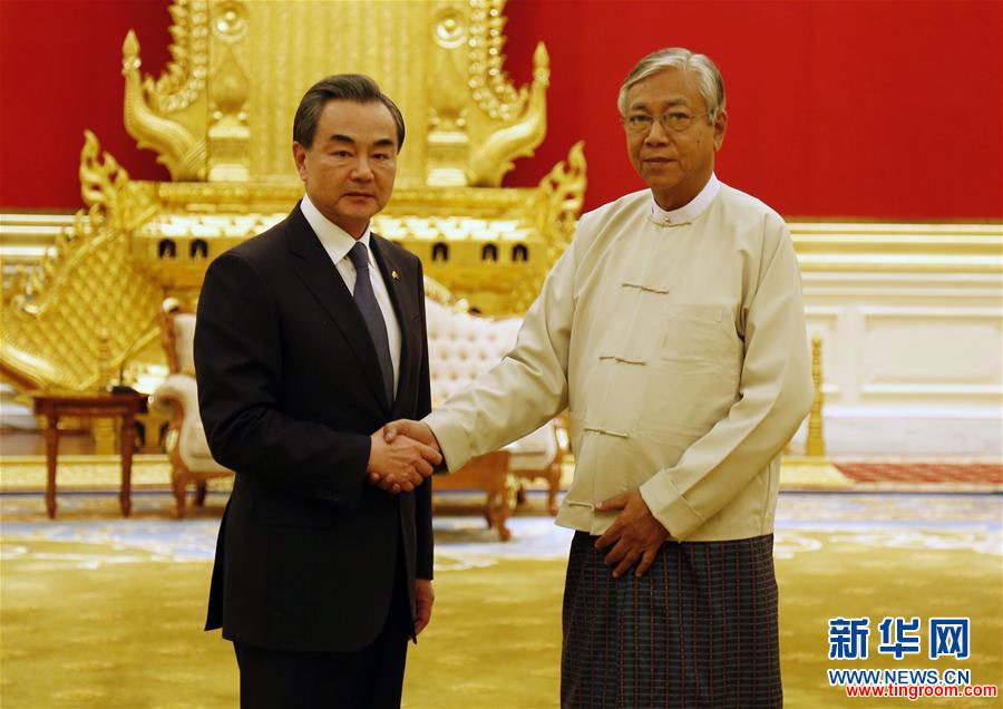 Chinese Foreign Minister Wang Yi meets with Myanmar President Htin Kyaw on April 6, 2016. [Photo: Xinhua]