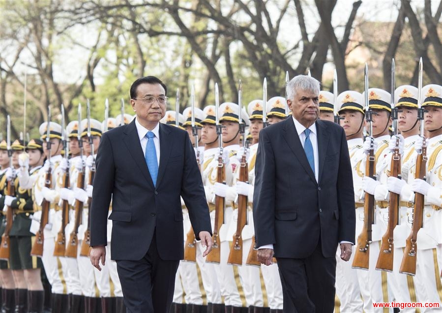  Chinese Premier Li Keqiang (L) holds a welcoming ceremony for Sri Lankan Prime Minister Ranil Wickremesinghe in Beijing, China, April 7, 2016. (Xinhua/Wang Ye) 