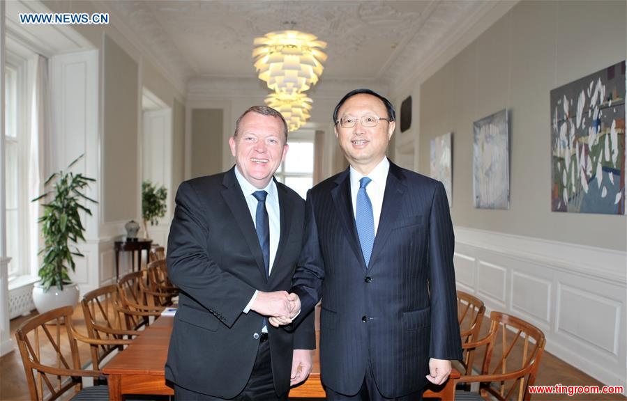 COPENHAGEN, April 17, 2016 (Xinhua) -- Danish Prime Minister Lars Loekke Rasmussen (L) shakes hands with visiting Chinese State Councilor Yang Jiechi during their meeting in Copenhagen, Denmark, April 17, 2016. (Xinhua/Shi Shouhe) 