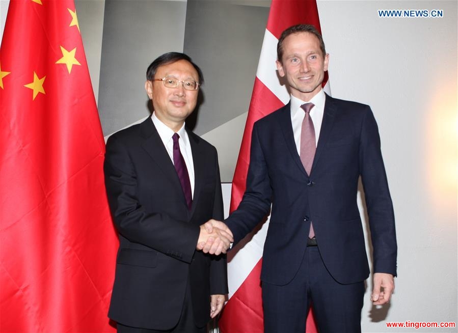 COPENHAGEN, April 17, 2016 (Xinhua) -- Visiting Chinese State Councilor Yang Jiechi (L) shakes hands with Danish Foreign Minister Kristian Jensen during their talks in Copenhagen, Denmark, April 16, 2016. Yang Jiechi held talks with Kristian Jensen here on Saturday, in which both sides agreed to push forward the comprehensive strategic partnership between the two countries. (Xinhua/Shi Shouhe)