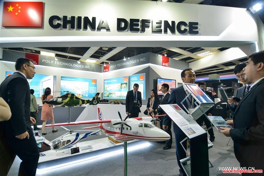  Visitors watch products in a China pavilion themed China Defence at the 2016 Defence Services Asia (DSA) exhibition in Kuala Lumpur, capital of Malaysia, on April 18, 2016. Three Chinese companies, Poly Technologies, China National Precision Machinery Import and Export Corporation (CPMIEC) and CETC International joined the Airbus and BAE systems in the 2016 Defence Services Asia (DSA) exhibition held in the Malaysian capital this week. (Xinhua/Chong Voon Chung)