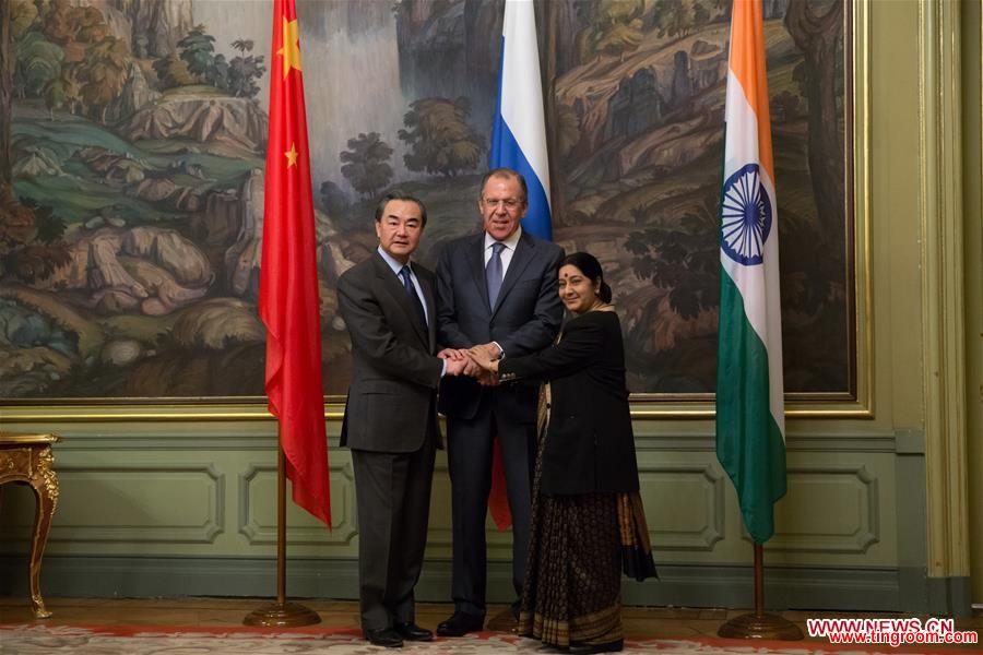 MOSCOW, April 18, 2016 (Xinhua) -- Chinese Foreign Minister Wang Yi (L), Russian Foreign Minister Sergey Lavrov (C) and Indian External Affairs Minister Sushma Swaraj attend the 14th Meeting of the Foreign Ministers of China, Russia and India, in Moscow, capital of Russia, on April 18, 2016. (Xinhua/Bai Xueqi)