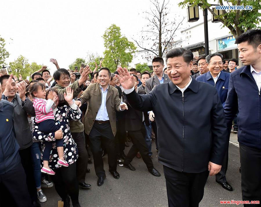 Chinese President Xi Jinping greets villagers in Xiaogang Village of Fengyang County, Chuzhou City, east China