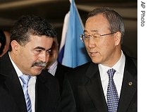 Israeli Defense Minister Amir Peretz, left, listens to UN Secretary General Ban Ki-moon, right, upon the latter's arrival at Ben Gurion airport near Tel-Aviv, Israel