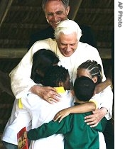 Pope Benedict XVI hugs children during a visit to a drug rehabilitation center called 'Fazenda da Esperanca' or Farm of Hope in Guaratingueta, Brazil, 12 May 2007