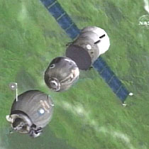 Soyuz capsule re-enters Earth