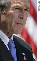 President Bush wears an AIDS awareness pin on his lapel as he speaks about the President's Emergency Plan for AIDS Relief (PEPFAR), 30 May 2007