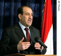 Iraqi PM Nouri al-Maliki talks to the media during a press conference in the heavily fortified Green Zone, 12 Aug 2007 