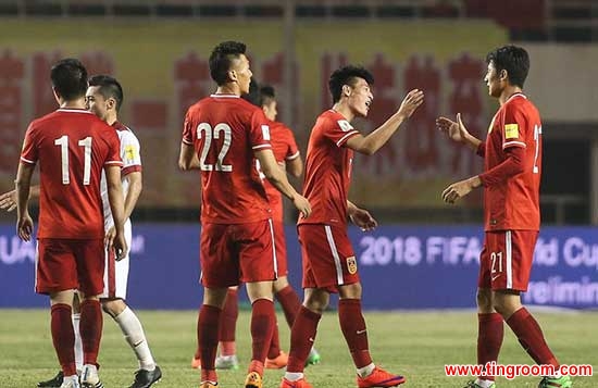Chinese players react during a game against Qatar in Xi’an on Tuesday, March 29, 2016. 